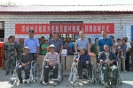 6月22日，地区残联为克孜贝提村贫困残疾人捐赠轮椅，受助残疾人喜上眉梢.JPG - 残疾人联合会