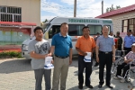 6月23日，地区残联到克孜别克村为听障人士捐赠助听器.JPG - 残疾人联合会