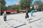 乌鲁木齐市米东区：广场地书比赛接地气 - 市政府