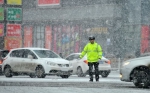 春分时节乌鲁木齐雪纷飞 北疆开春时间推迟一周左右 - 人民网